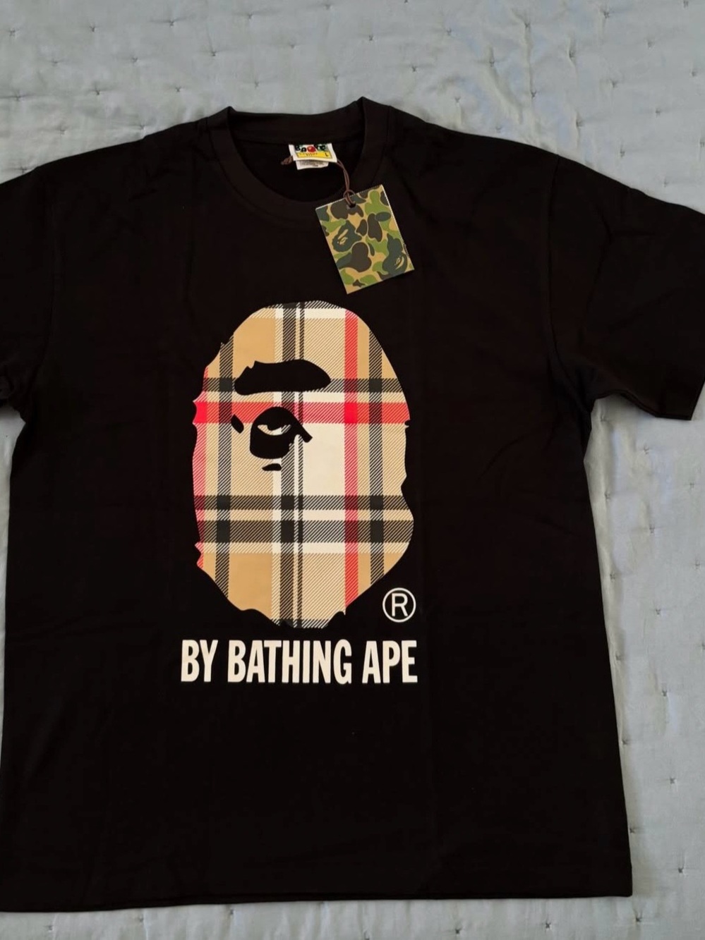 BAPE Black Short-Sleeve Graphic Tee with Plaid Ape Motif